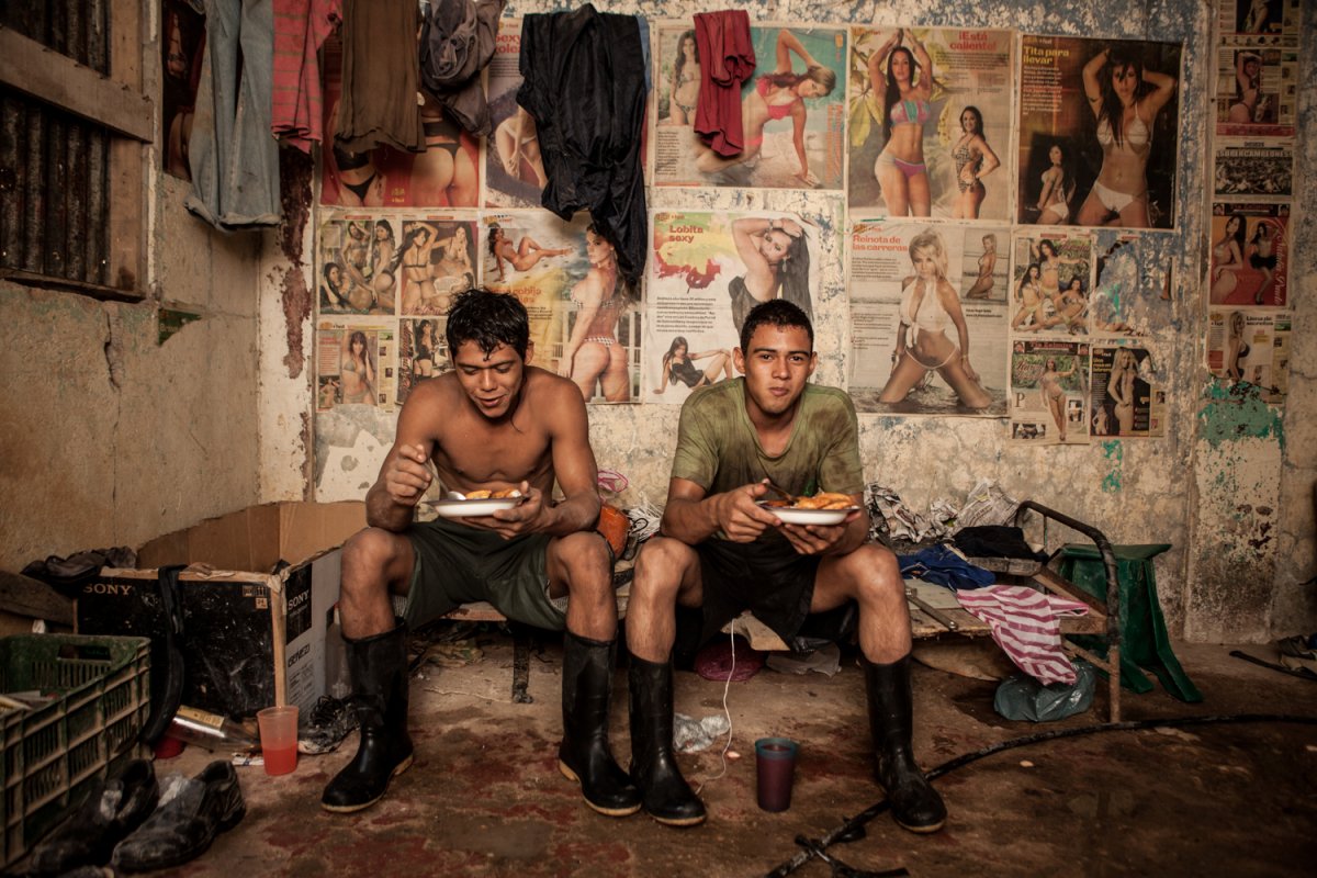 Gold miners of the abangares gold mine in costa rica eat dinner