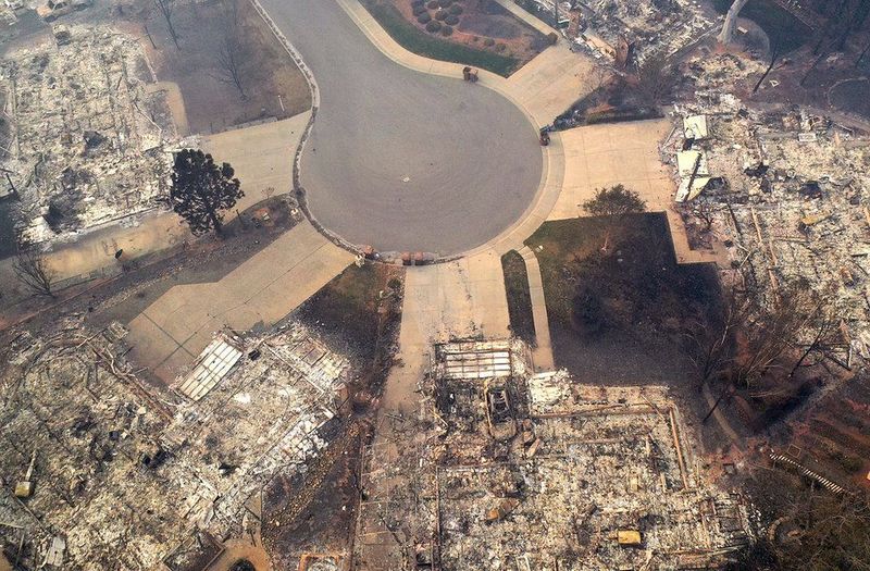 Вид с воздуха на город Paradise, полностью уничтоженный самым сильным пожаром в истории Калифорнии в ноябре. Пожар уничтожил тысячи домов и убил более 80 человек. Фото: JUSTIN SULLIVAN / GETTY IMAGES